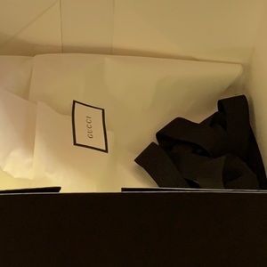 Gucci ribbon and tissue paper
